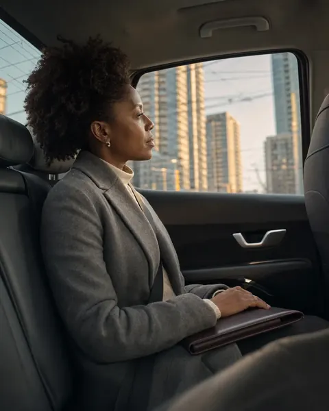 Rideshare passenger travelling through the Greater Toronto Area at golden hour